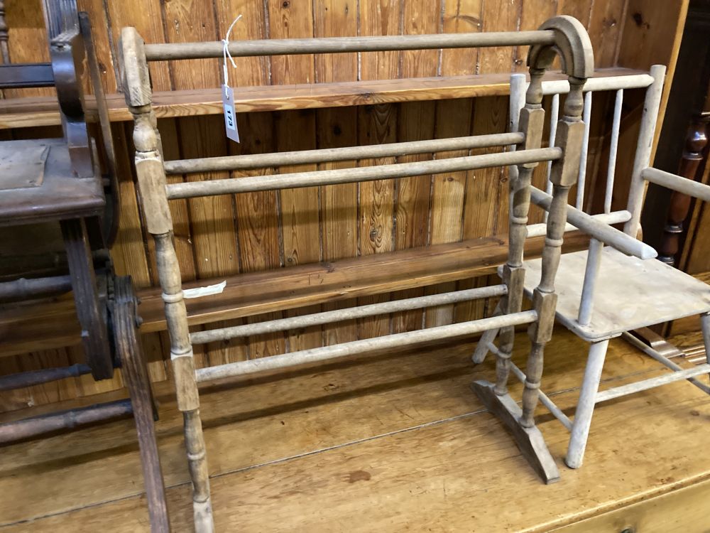 A Victorian towel rail, a primitive childs elbow chair and a metamorphic chair